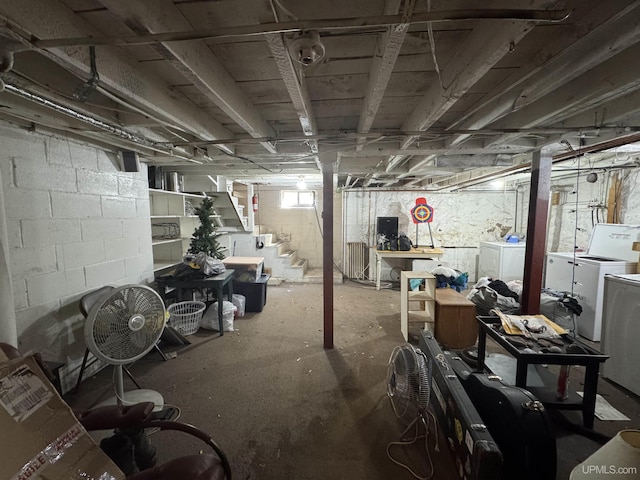 643 S Pine St, Ishpeming, MI 49849 - basement featuring washer and dryer and stairs