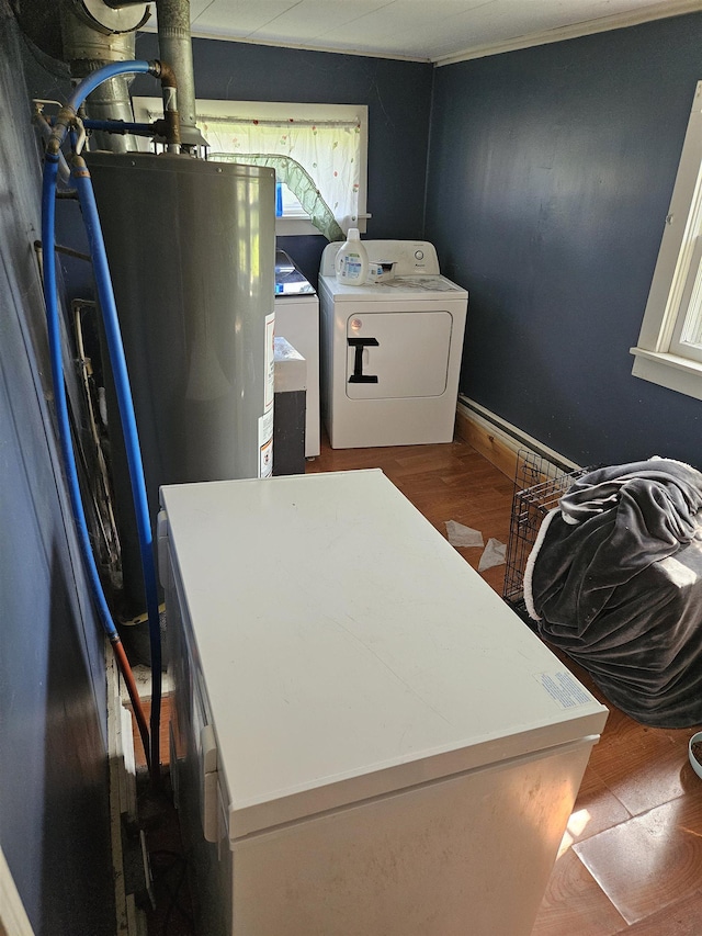 112 Euclid St, Saint Louis, MI 48880 - washroom featuring independent washer and dryer, wood finished floors, and baseboards