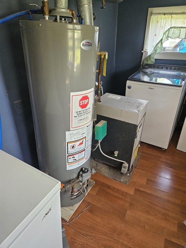 112 Euclid St, Saint Louis, MI 48880 - utility room with water heater