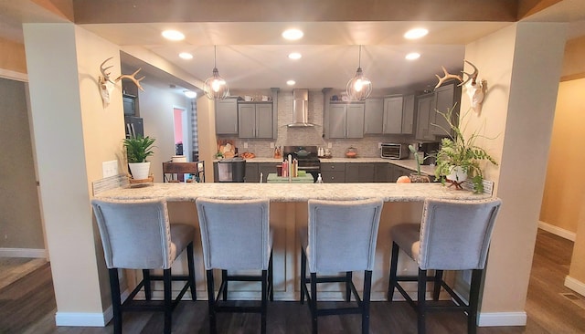 3787 Shepherd Rd, Midland, MI 48880 - kitchen with wall chimney range hood, gray cabinets, stainless steel range with electric stovetop, a peninsula, and recessed lighting