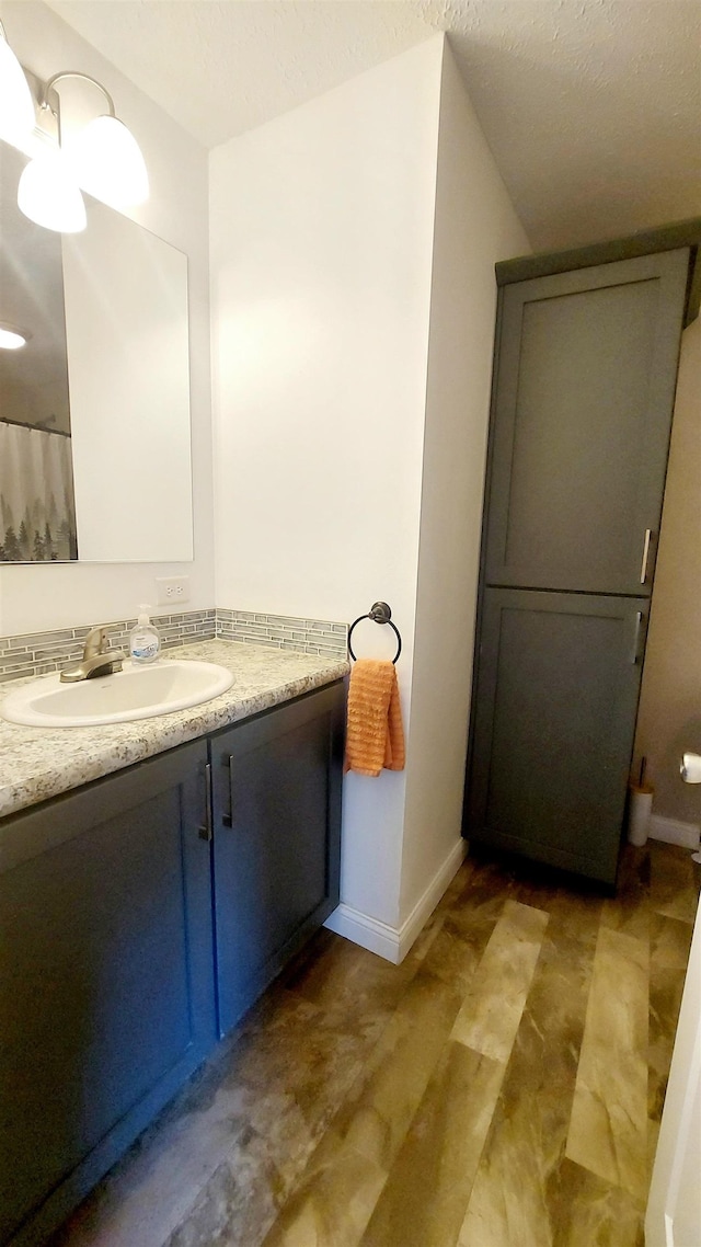 3787 Shepherd Rd, Midland, MI 48880 - bathroom featuring vanity and baseboards