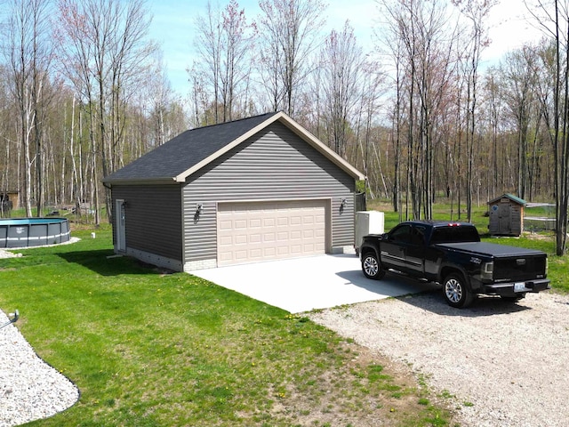 3787 Shepherd Rd, Midland, MI 48880 - detached garage with an outdoor pool
