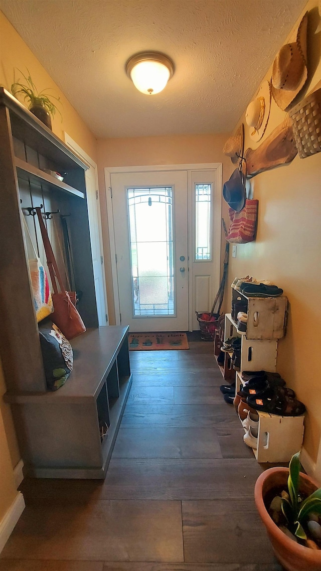 3787 Shepherd Rd, Midland, MI 48880 - mudroom with a textured ceiling and hardwood / wood-style flooring