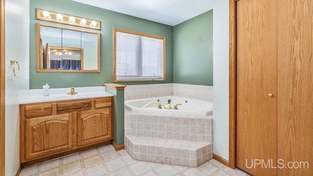 1000 N Evergreen Dr, Iron Mountain, MI 49801 - full bathroom with a bath, vanity, and tile patterned floors
