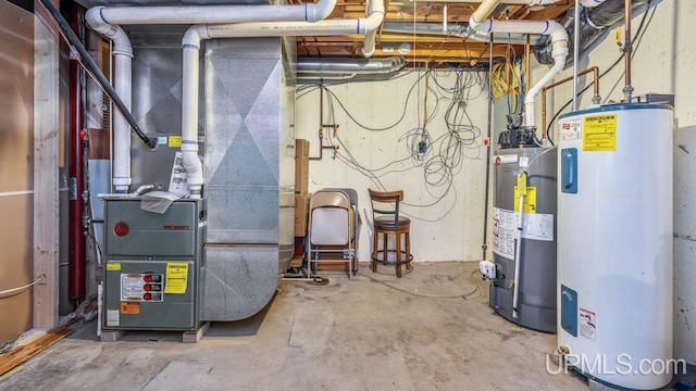 1000 N Evergreen Dr, Iron Mountain, MI 49801 - utilities featuring electric water heater, gas water heater, and heating unit