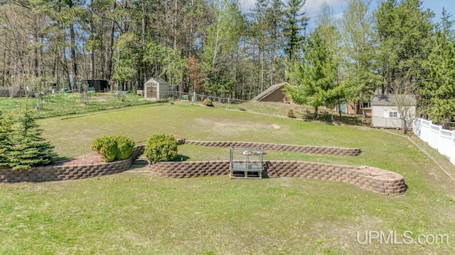 1000 N Evergreen Dr, Iron Mountain, MI 49801 - view of yard featuring a shed and an outdoor structure