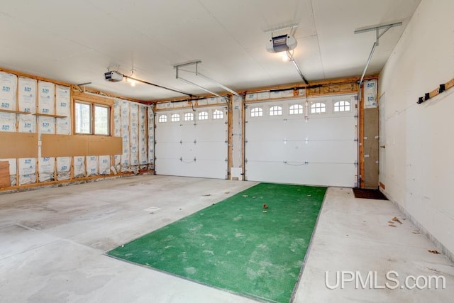 8962 Stagecoach Q.5 Ave, Gladstone, MI 49837 - garage with a garage door opener