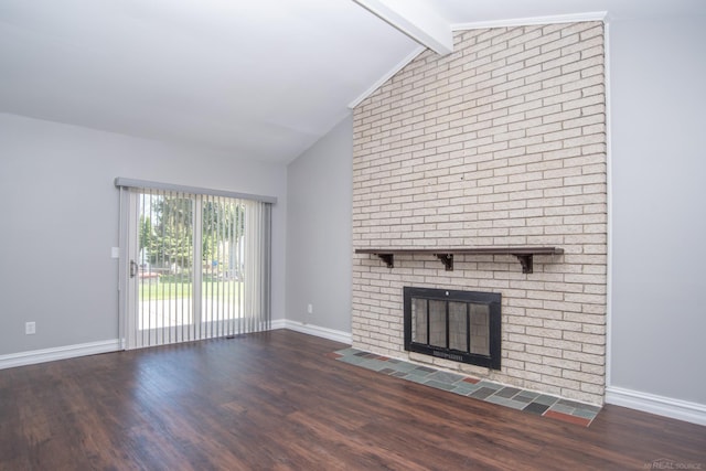 unfurnished living room with wood finished floors, a fireplace, and baseboards