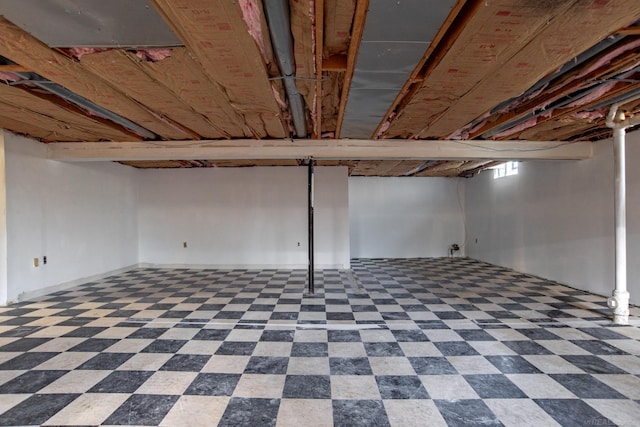 basement with dark floors