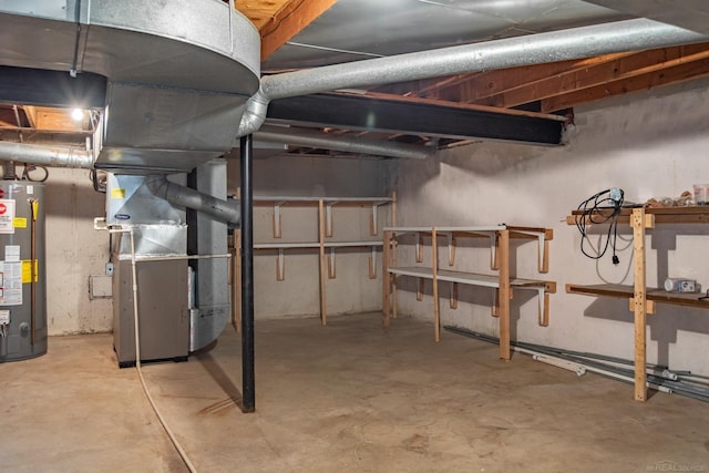 unfinished below grade area with gas water heater and heating unit