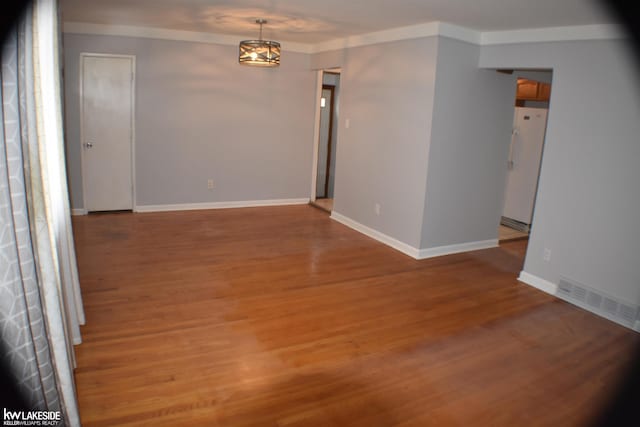 19508 Salisbury St, Saint Clair Shores, MI 48080 - unfurnished room with light wood-style flooring and baseboards
