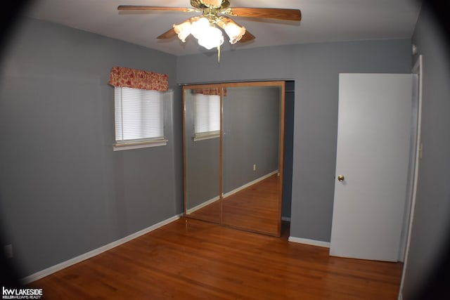19508 Salisbury St, Saint Clair Shores, MI 48080 - unfurnished bedroom featuring wood finished floors, a closet, ceiling fan, and baseboards