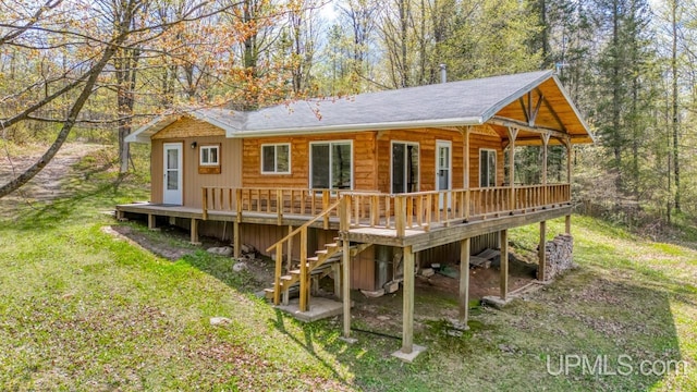 9190 Blue Jay Ln, Florence T-Wi, WI 54121 - back of house featuring stairs, a wooden deck, a yard, and roof with shingles