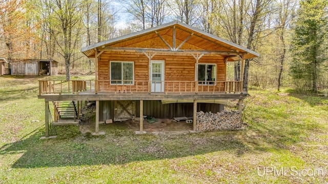 9190 Blue Jay Ln, Florence T-Wi, WI 54121 - rear view of property featuring a wooden deck, a yard, and stairway