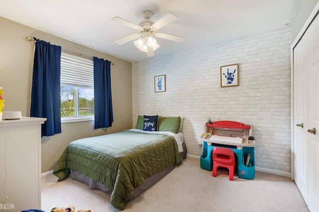 35657 Pierce St, Richmond, MI 48062 - carpeted bedroom featuring brick wall, an accent wall, and ceiling fan