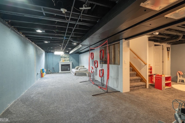 35657 Pierce St, Richmond, MI 48062 - finished basement featuring stairway, a fireplace, and carpet