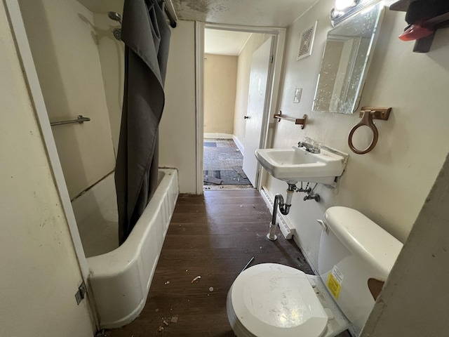 106 S Chilson St, Bay City, MI 48706 - full bathroom with toilet and hardwood / wood-style floors