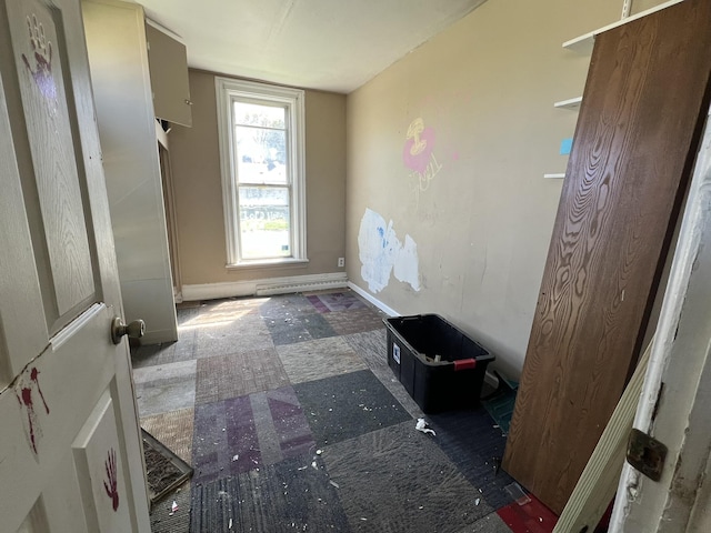 106 S Chilson St, Bay City, MI 48706 - doorway to outside with baseboards and tile patterned floors