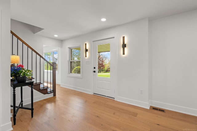 7533 Roberta Ln, Washington T-Wi, MI 48094 - entrance foyer featuring light wood finished floors, baseboards, stairway, and recessed lighting