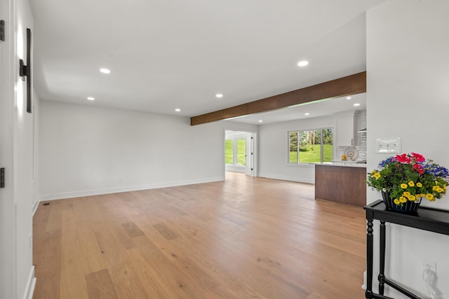 7533 Roberta Ln, Washington T-Wi, MI 48094 - living room with recessed lighting, light wood finished floors, baseboards, and beamed ceiling