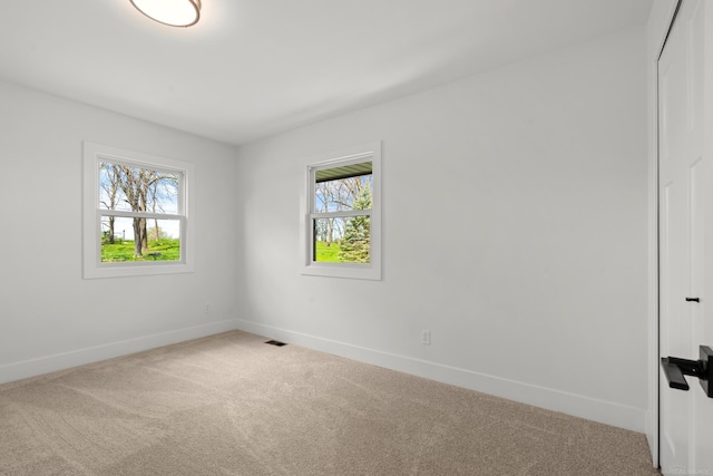 7533 Roberta Ln, Washington T-Wi, MI 48094 - empty room with carpet floors and baseboards