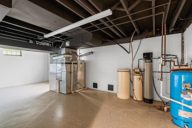 7533 Roberta Ln, Washington T-Wi, MI 48094 - basement with a water pressure tank, a water softener system, and water heater