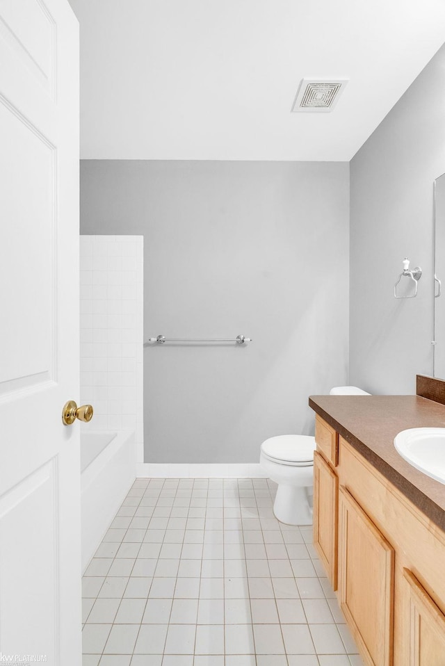 51663 Hale Ln, Chesterfield, MI 48051 - bathroom with vanity, a bath, toilet, baseboards, and tile patterned floors