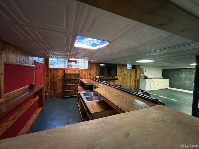 258 W Jasper St, Gwinn, MI 49841 - bar area with wooden walls, an ornate ceiling, a sink, and baseboards