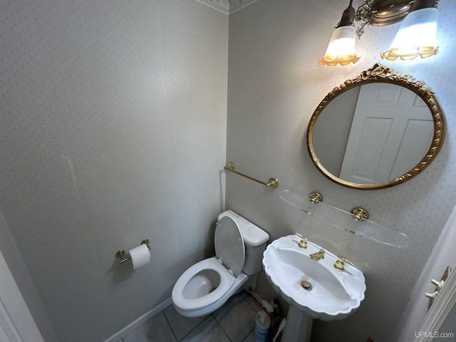 258 W Jasper St, Gwinn, MI 49841 - bathroom featuring tile patterned flooring, a sink, and toilet