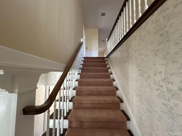258 W Jasper St, Gwinn, MI 49841 - staircase featuring wallpapered walls and baseboards