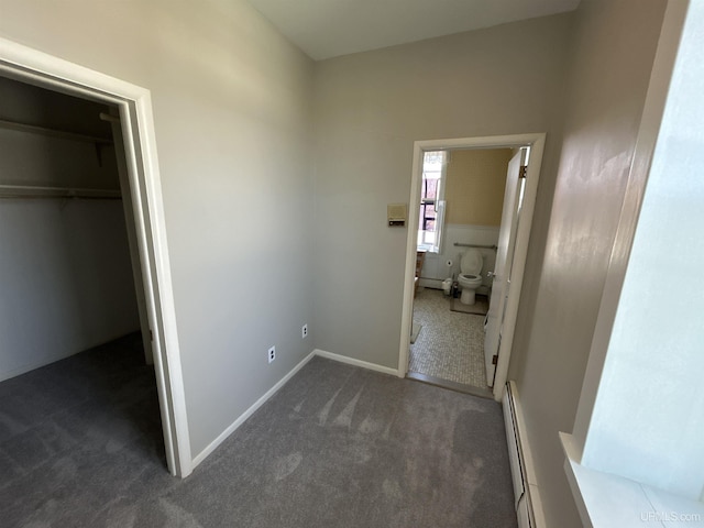 258 W Jasper St, Gwinn, MI 49841 - hall featuring a baseboard heating unit, carpet flooring, and baseboards