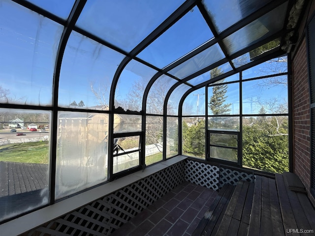 258 W Jasper St, Gwinn, MI 49841 - unfurnished sunroom featuring plenty of natural light