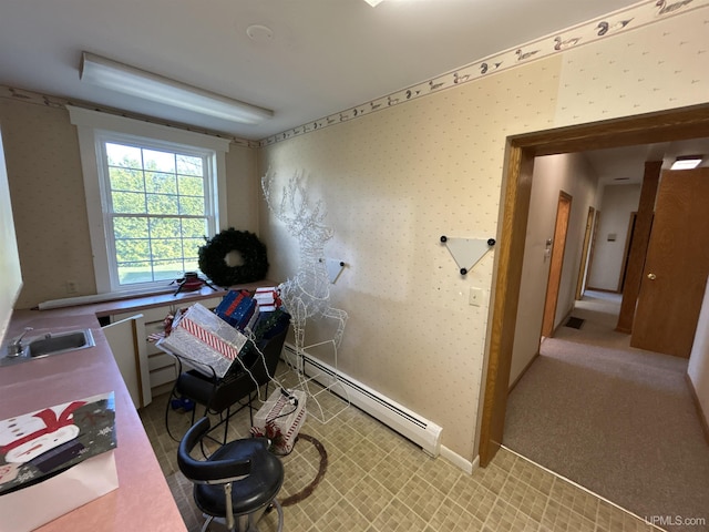 258 W Jasper St, Gwinn, MI 49841 - miscellaneous room featuring a baseboard radiator, a sink, and wallpapered walls