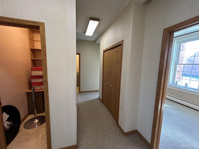 258 W Jasper St, Gwinn, MI 49841 - hallway featuring baseboards, baseboard heating, and light carpet