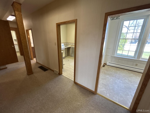 258 W Jasper St, Gwinn, MI 49841 - hall with a baseboard radiator, baseboards, and carpet flooring