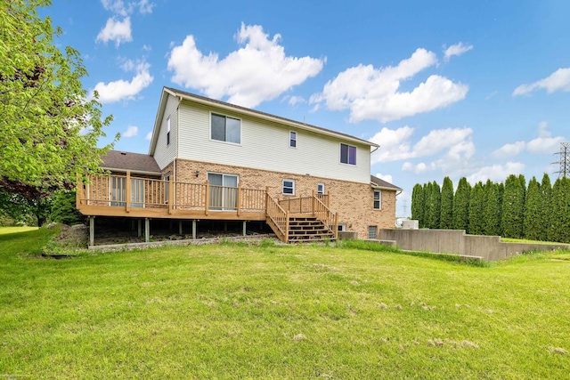 back of house with a wooden deck, brick siding, and stairs