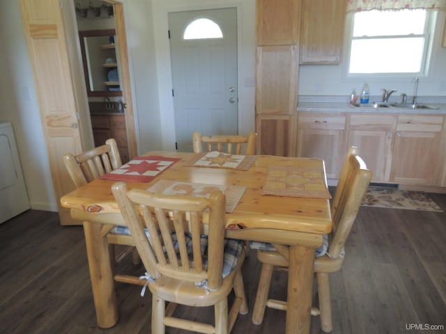 8653 Ll Rd, Rapid River, MI 49878 - dining room featuring dark wood-type flooring