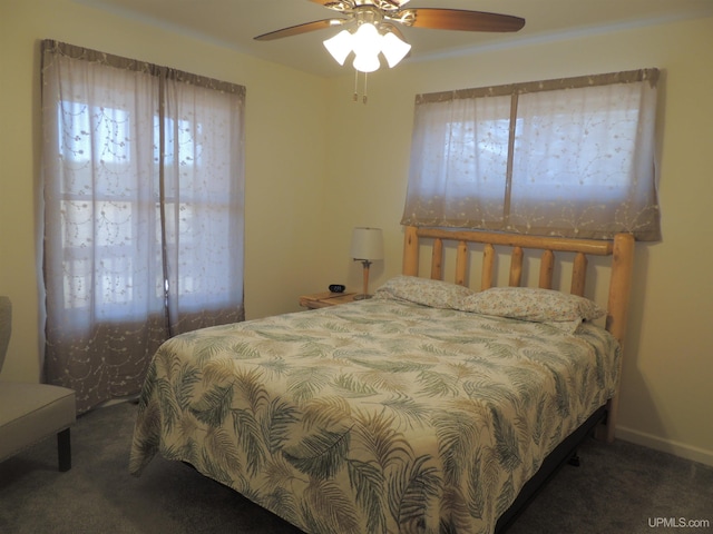 8653 Ll Rd, Rapid River, MI 49878 - carpeted bedroom with ceiling fan