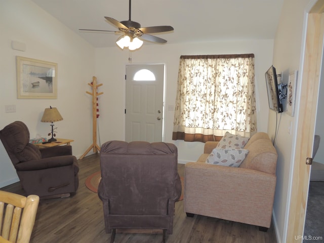 8653 Ll Rd, Rapid River, MI 49878 - living area with wood finished floors, ceiling fan, and baseboards