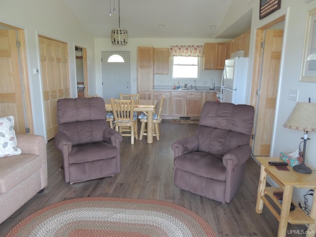 8653 Ll Rd, Rapid River, MI 49878 - living room with dark wood-type flooring and lofted ceiling