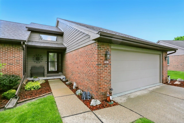 45765 Meadows Cir W, Macomb Twp, MI 48044 - view of property exterior featuring brick siding, a garage, concrete driveway, and roof with shingles