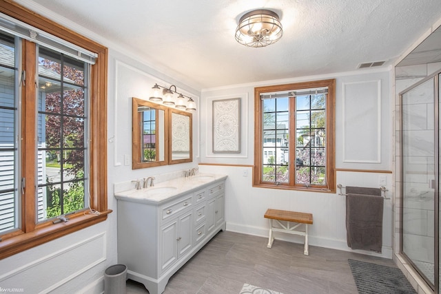 2758 Military St, Port Huron, MI 48060 - full bath featuring double vanity, baseboards, and a stall shower