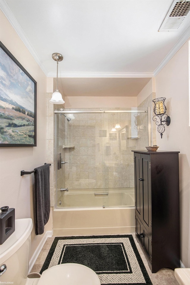 2758 Military St, Port Huron, MI 48060 - bathroom with toilet, bathing tub / shower combination, ornamental molding, and tile patterned floors