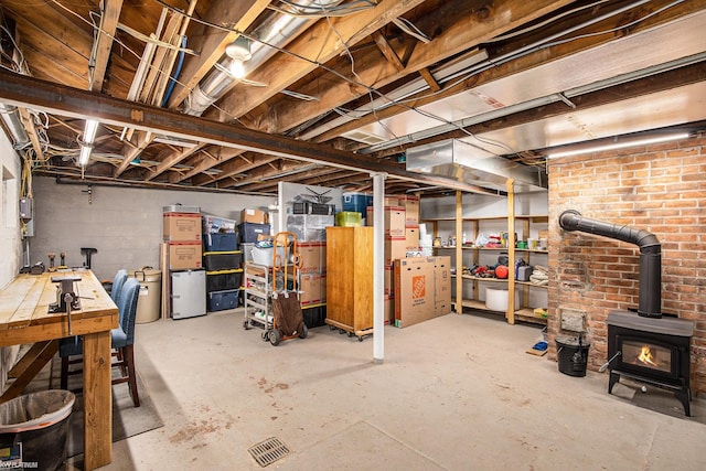 2758 Military St, Port Huron, MI 48060 - unfinished below grade area with a wood stove