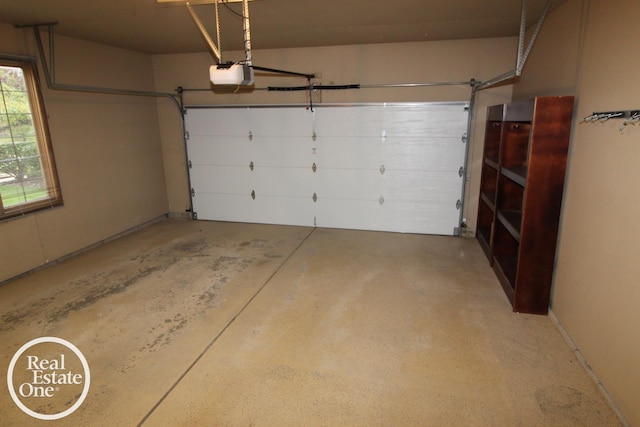 16876 Pebble Ct, Macomb, MI 48042 - garage featuring a garage door opener