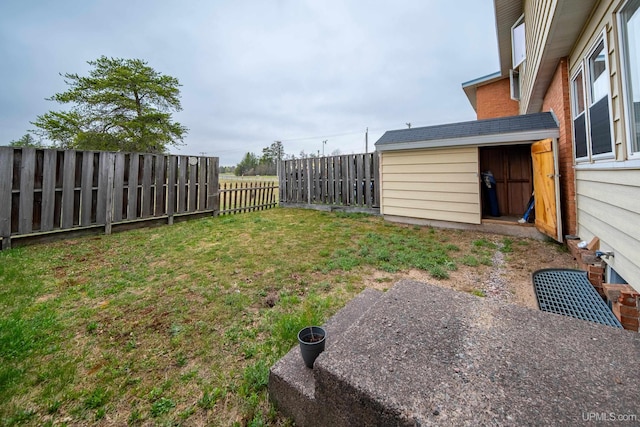 405 Mustang St, Gwinn, MI 49841 - view of yard with an outbuilding and a storage unit