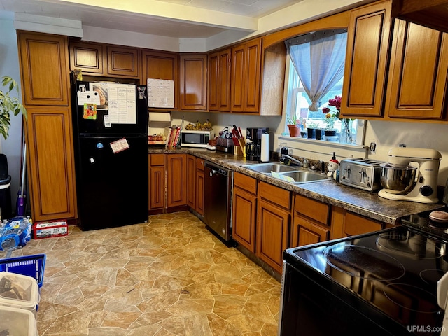 1389 15.5 Rd, Bark River, MI 49807 - kitchen with black appliances, a sink, brown cabinets, and dark countertops