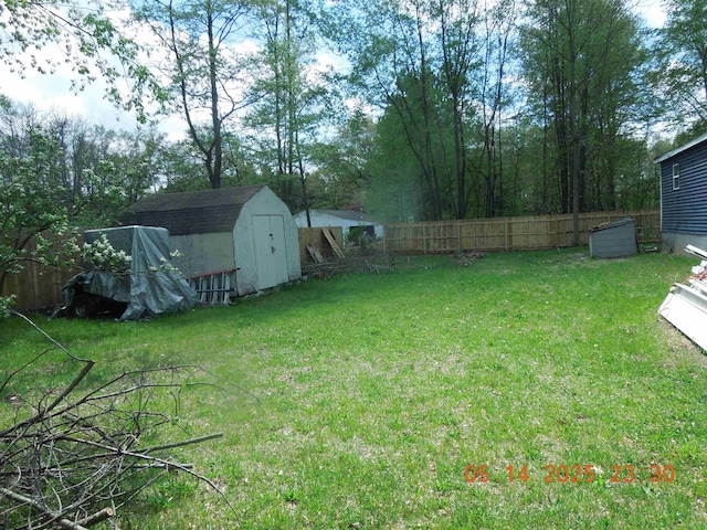 1582 Oakwood St, Gladwin, MI 48624 - view of yard with a shed and an outdoor structure