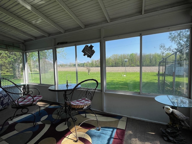 sunroom / solarium featuring plenty of natural light