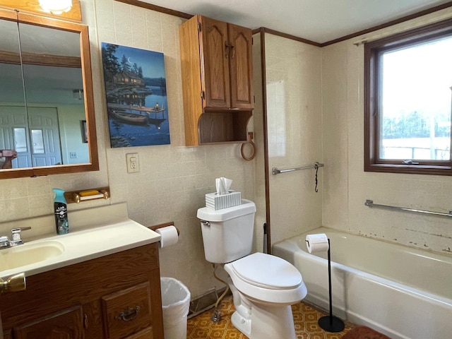 full bath featuring toilet, tasteful backsplash, vanity, ornamental molding, and tile walls